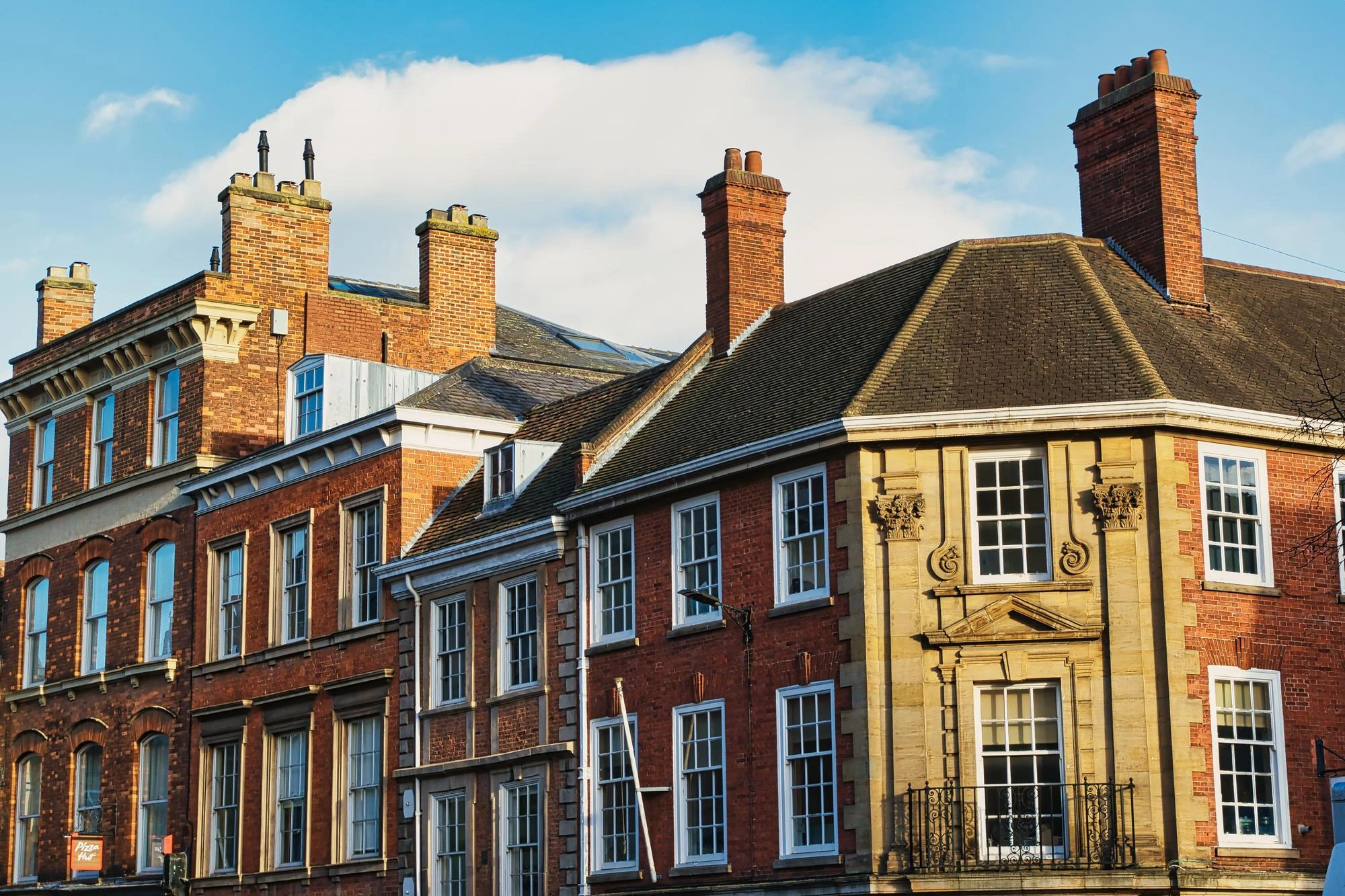 historic-brick-buildings-with-classic-british-architecture-clear-blue-sky-york-uk