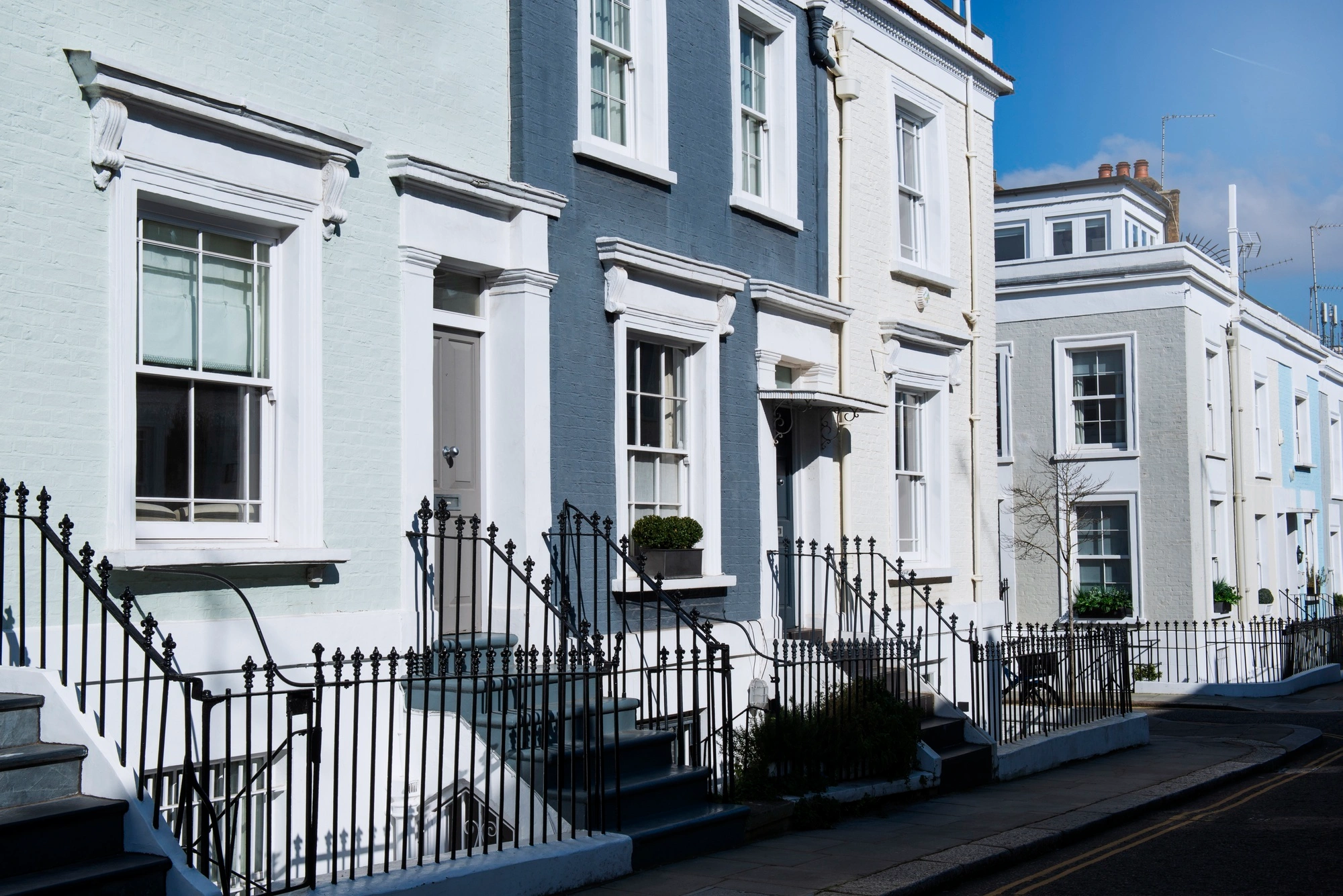 side-view-front-doors-with-white-blue-wall